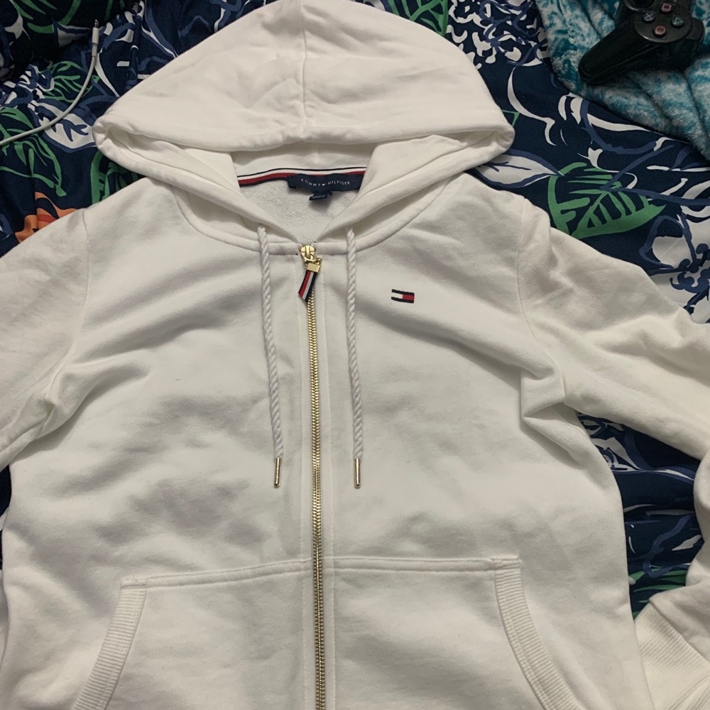 Tommy Hilfiger Zip Up with gold detailing.